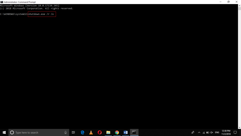 Run command shutdown.exe /r /o